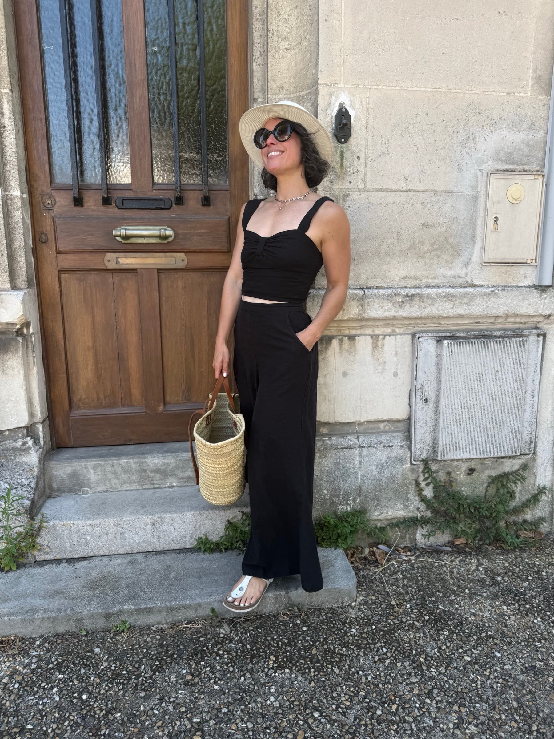 Maddy outside an old doorway in Europe