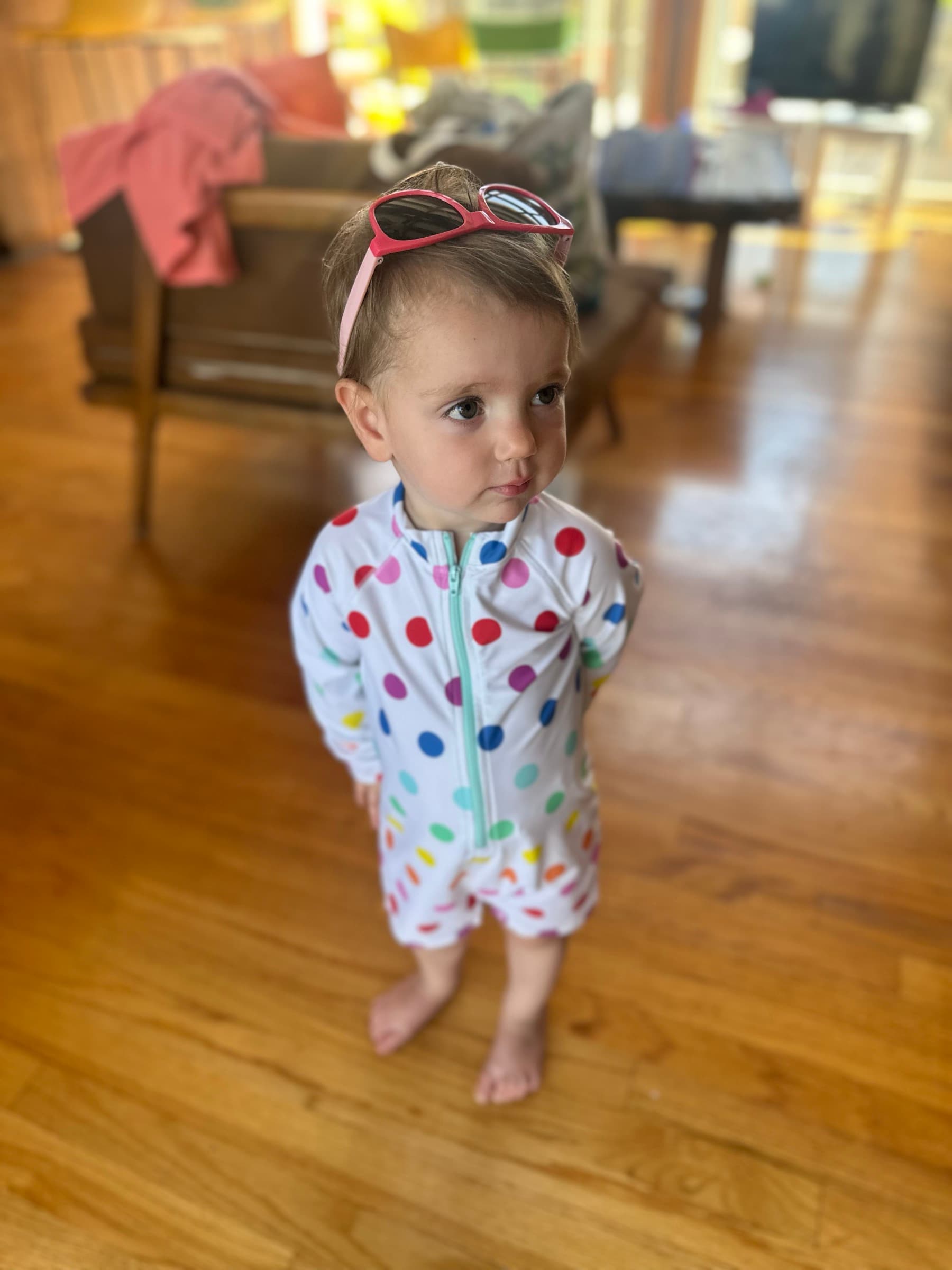 Maddy's youngest in a polka-dot swimsuit